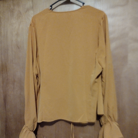 Wrapped blouse - Picture 2 of 13